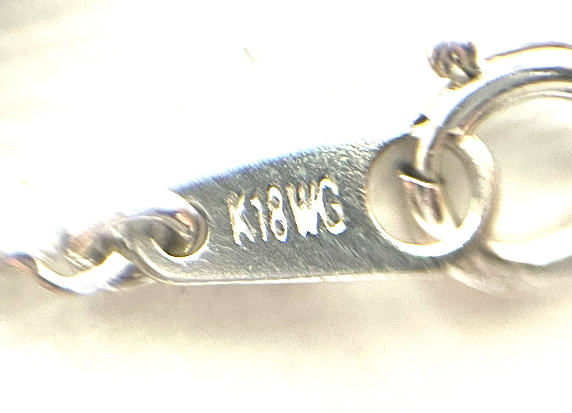 K18WG ピンク石　ダイヤ付きNC アジャスター付き