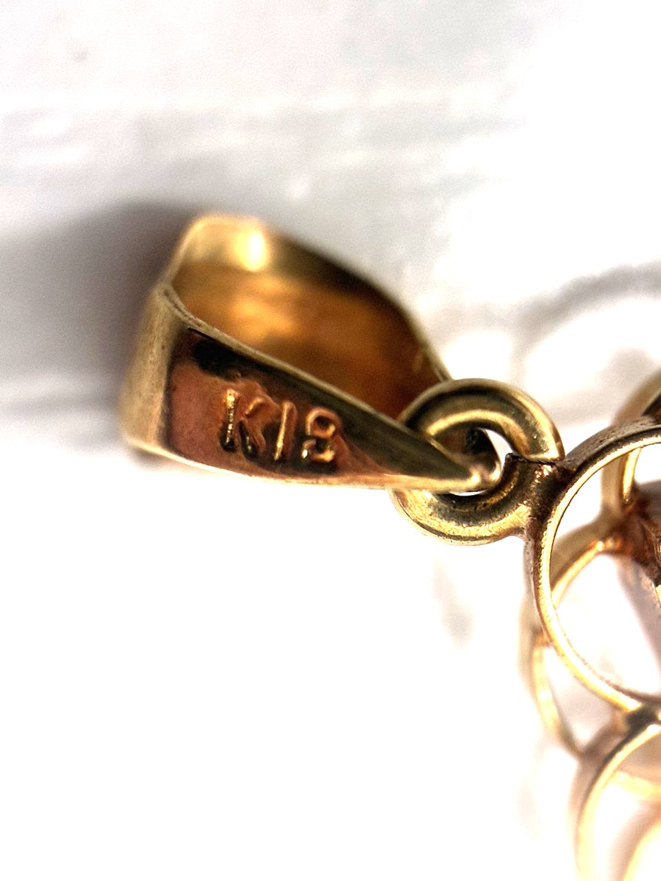 K18 ペンダントトップ（石がとれてしまった状態）