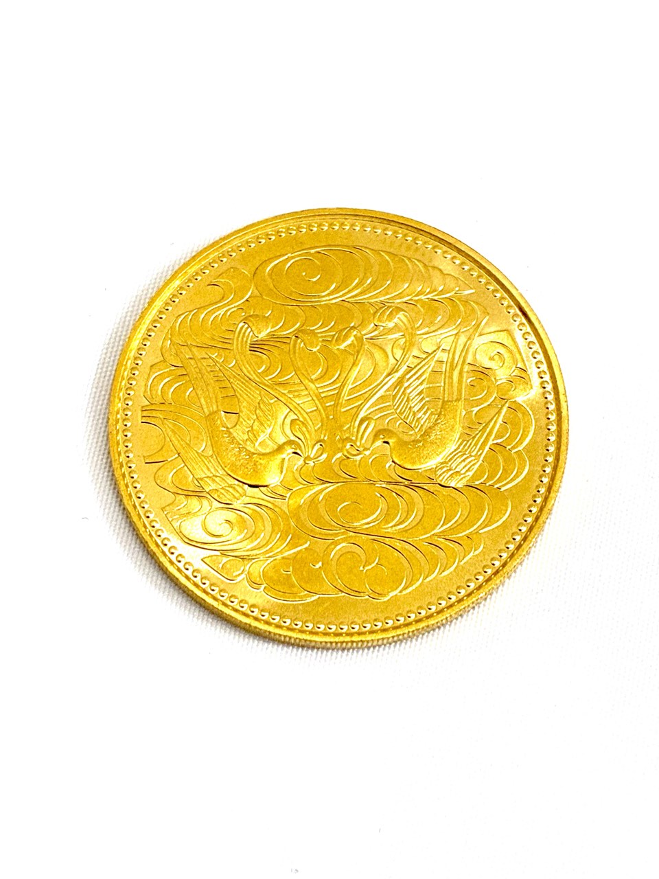 天皇陛下御在位60年記念10万円金貨